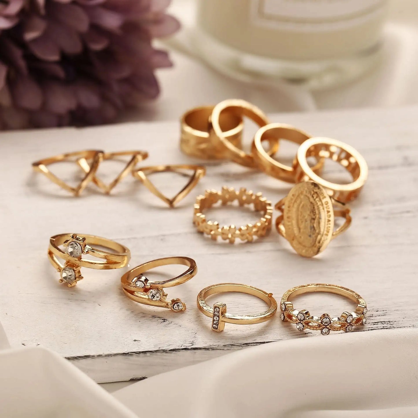 Set of 13 rings with medallion and Austrian crystals