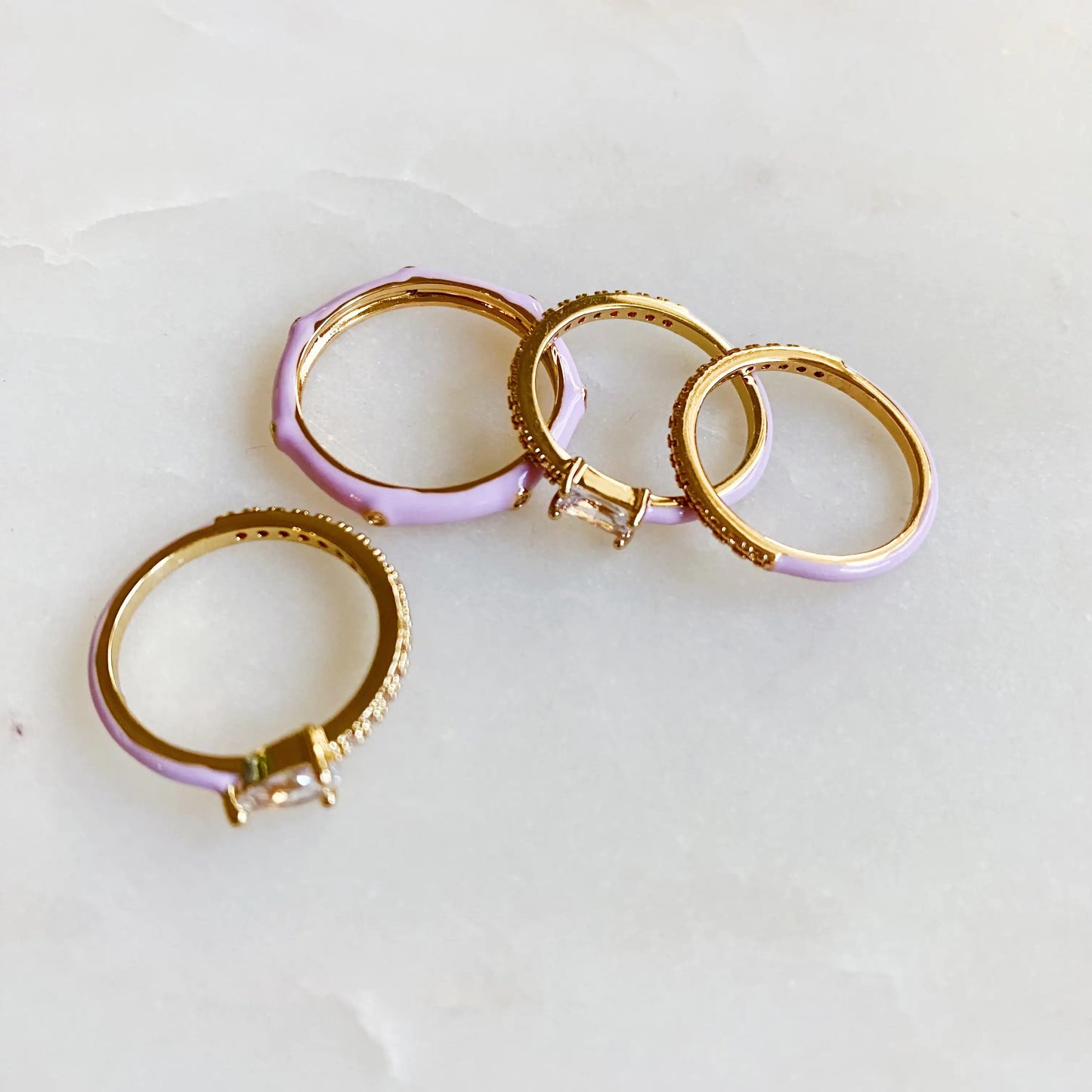 Juego de 4 anillos de estilo glamuroso en tonos pastel