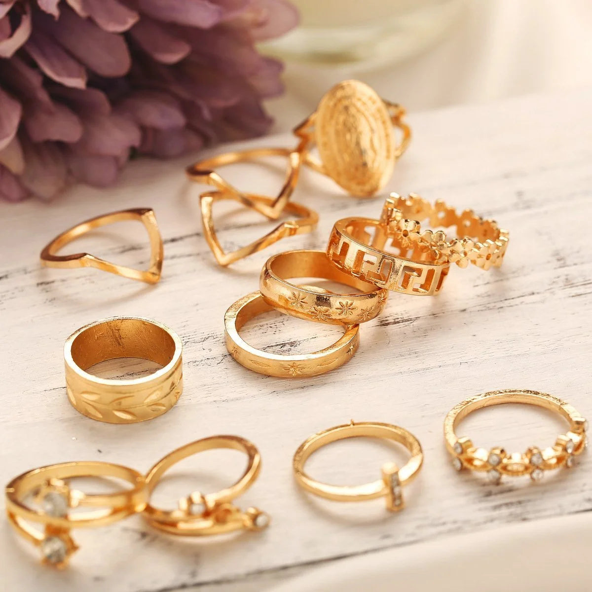 Set of 13 rings with medallion and Austrian crystals