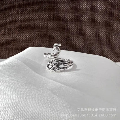 Anillo vintage de pavo real y koi con diseño ajustable