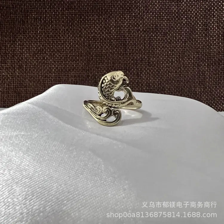 Anillo vintage de pavo real y koi con diseño ajustable