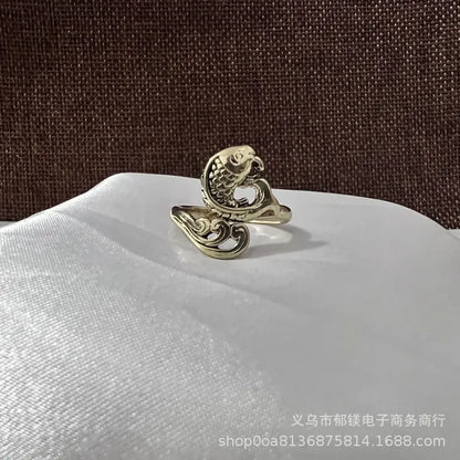 Anillo vintage de pavo real y koi con diseño ajustable