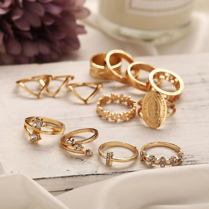 Juego de 13 Anillos con Medallón