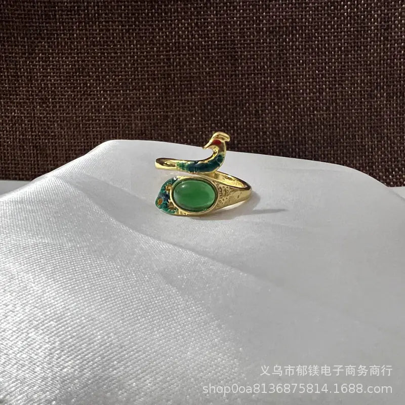 Anillo vintage de pavo real y koi con diseño ajustable