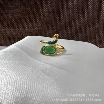 Anillo vintage de pavo real y koi con diseño ajustable