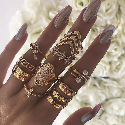 Juego de 13 Anillos con Medallón