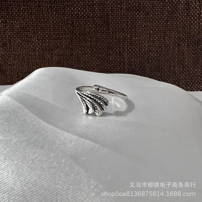 Anillo vintage de pavo real y koi con diseño ajustable