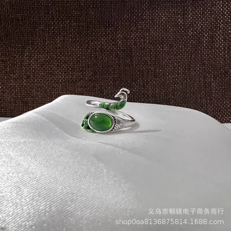 Anillo vintage de pavo real y koi con diseño ajustable