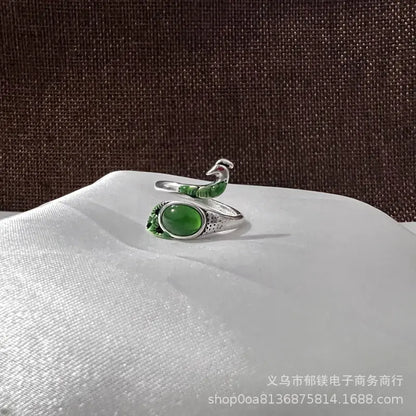 Anillo vintage de pavo real y koi con diseño ajustable