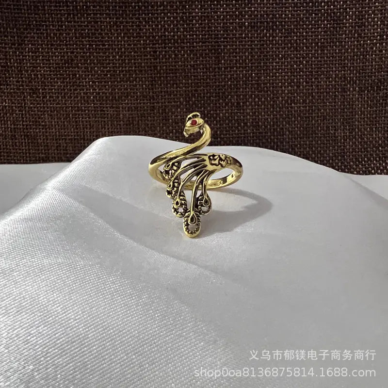 Anillo vintage de pavo real y koi con diseño ajustable
