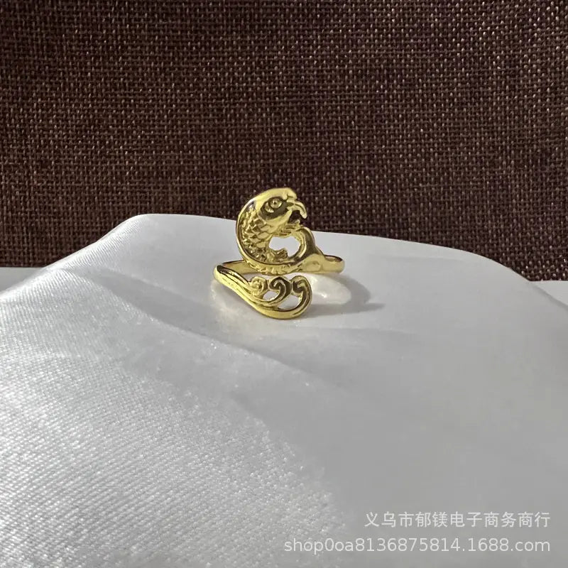 Anillo vintage de pavo real y koi con diseño ajustable