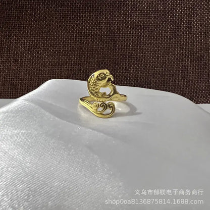Anillo vintage de pavo real y koi con diseño ajustable