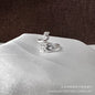 Anillo vintage de pavo real y koi con diseño ajustable